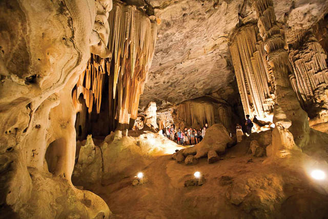 tourist group at cango caves in oudtshoorn, south africa