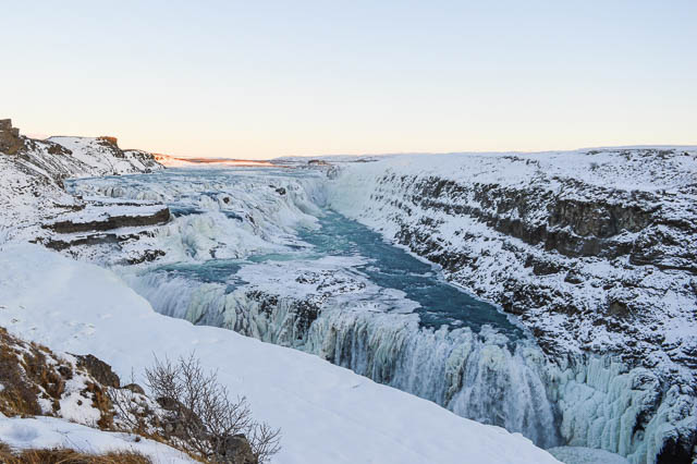 gullfoss waterfall covered in snow in iceland