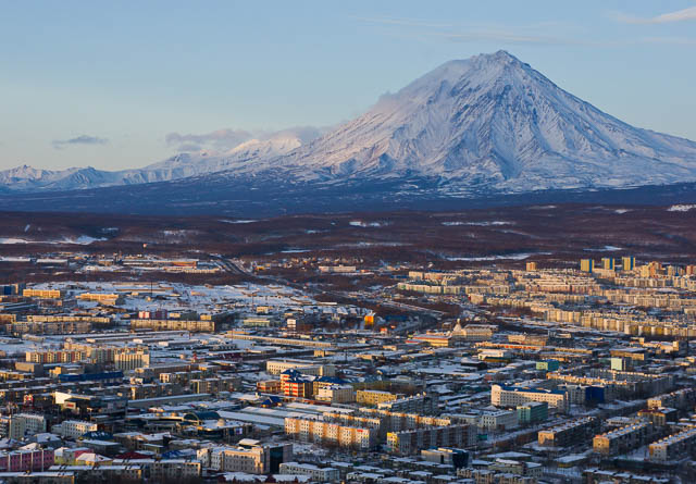 snow capped koryaksky volcano seen from petropavlovsk kamchatsky city in russia