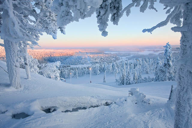 orange sky across kittila landscape as sun rises