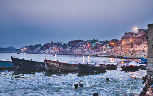 street lights light up near a ghat in varanasi india