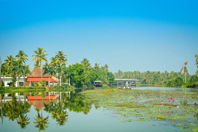 village view from the backwaters of vembanad lake, kerala