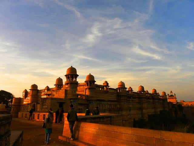 people enjoying sunset on gwalior fort in madhya pradesh